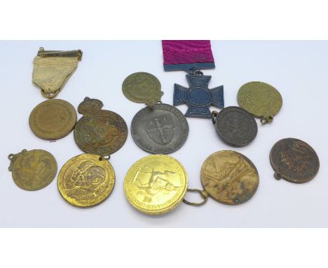 A WWI Victory medal to 30649 Cpl. E. Mather. Manch. R., a reproduction Victoria Cross and other medallions