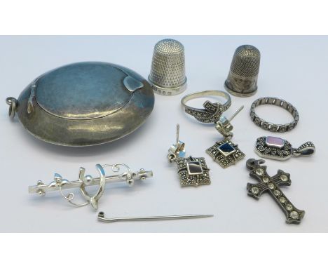 A Chinese silver powder puff, thimbles, etc., 49g