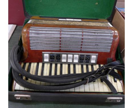 A Hohner Tango II M accordion, cased