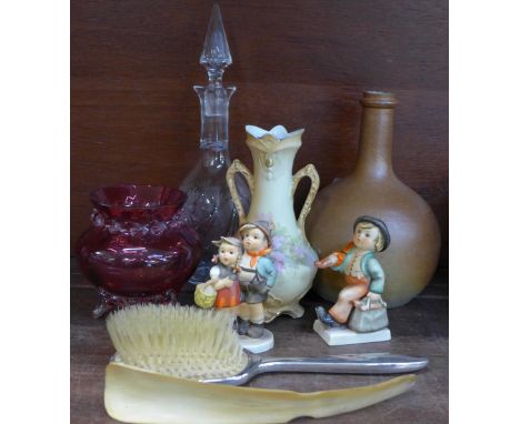 A brown stoneware bottle vase, a Victorian cranberry pot, an Austrian two handled vase, a cut glass decanter, two Hummel figu