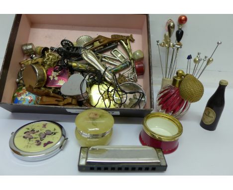 Hat pins, magnifying glass, harmonica, compacts, perfume bottles, etc.