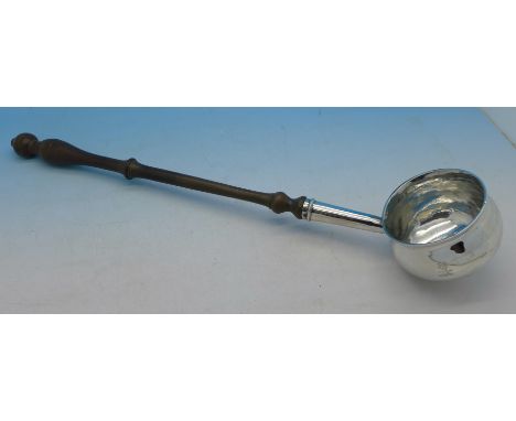 A silver punch ladle, Newcastle 1728, a/f, length 35cm