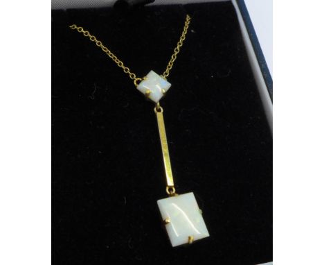 A 9ct gold and opal pendant and chain, weight of pendant 1.7g