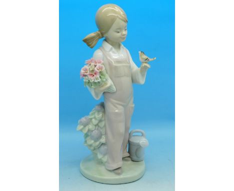 A Lladro figure, Spring Girl, 5217, one petal missing