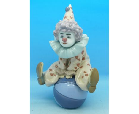 A Lladro figure, Having A Ball, 5813