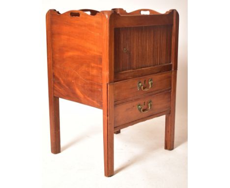 An 18th century George III mahogany tray top nightstand / bedside cabinet. The cabinet having a carved gallery edge top with 