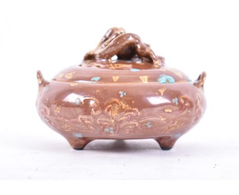 A late 19th century Chinese Oriental&nbsp;ceramic lidded censer. The censer having a lid with dragon holding the universe glo