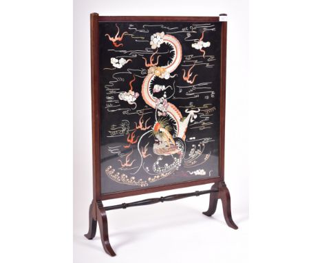 A late 19th century Chinese Oriental hand sewn silk on cotton embroidery panel&nbsp; / fire screen. The panel depicting a fou