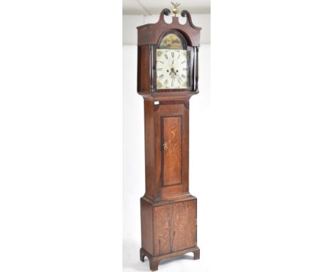 A George III early 19th century Preddy of Taunton oak West Country grandfather's longcase clock. The clock having scrolled fi