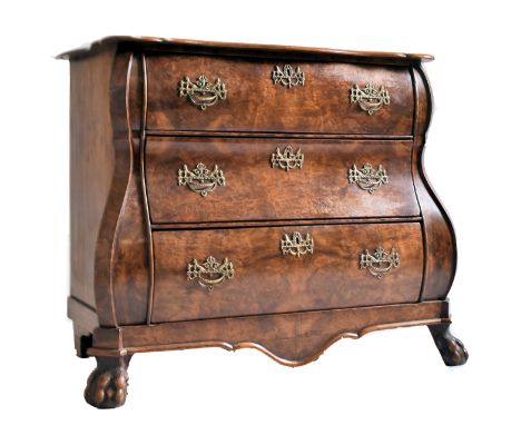 A Baroque 19th century Dutch burr walnut serpentine front chest of drawers / commode. The chest having a shaped chamfered edg