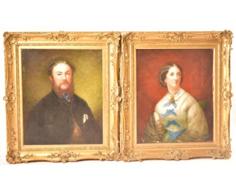 A pair of mid 19th century Victorian oil on canvas portrait paintings depicting a noble man and woman. The lady with coiffure