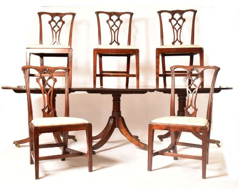 A high end 19th century Regency revival twin pedestal dining&nbsp;table and set of 12 Chippendale style mahogany dining chair