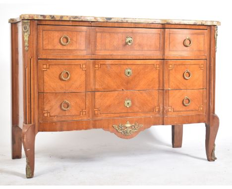 A mid 19th century French continental transitional manner kingwood breakfront chest of drawers. The commode having a shaped&n