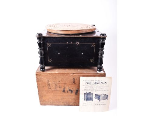A late 19th century Victorian Ariston portable polyphone complete with discs, a supplementary list of tunes and presented in 