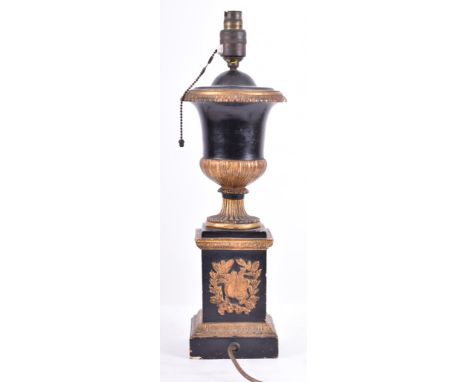 An early 20th century grand tour plaster neo-classical table lamp light. The ebonised and gilt parcel plaster column in the f