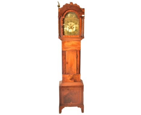 A 19th century George III mahogany marquetry inlaid eight day West country longcase clock. The longcase featuring a brass arc