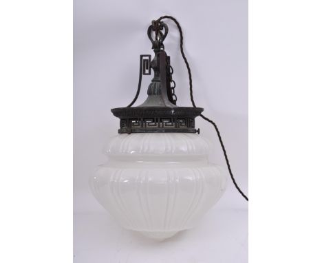 An early 20th century milk glass neo-classical electrolier - ceiling lantern lamp light. The light having a milk glass bulbou