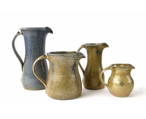 Four various studio ceramic stoneware glazed jugs, all bearing the same impressed maker's monogram, tallest 8.5" (4)