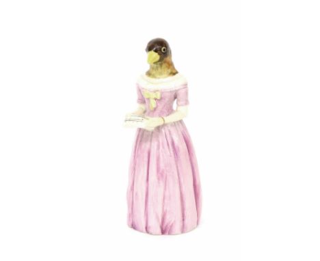 Royal Worcester porcelain candle snuffer of Jenny Lind, modelled in a long pink dress with a bird's head, puce factory mark, 