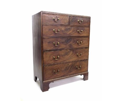 Large 19th century chest of drawers comprising two short and four long graduated drawers, upon bracket feet, 54" high, 42" wi