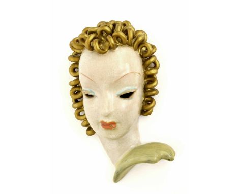 Goldscheider terracotta wall mask, modelled with golden ringlets, impressed number 8453 and factory stamped marks, 8.5" high