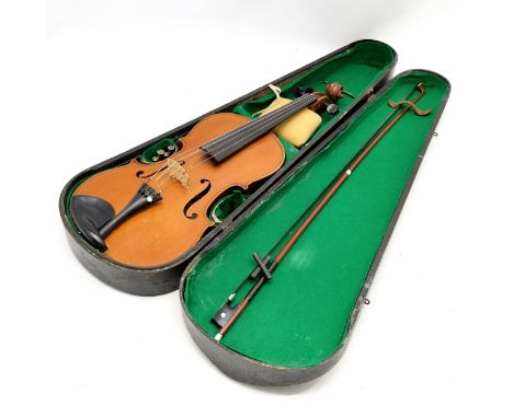 An early 20th century Stainer violin patent number 23140 60cm total length, with bow and in an antique case - in good used co