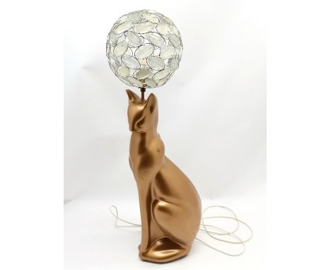 Mid century large plaster cat lamp painted gold and with a later round shade 86cm high total height - has a few small loses t