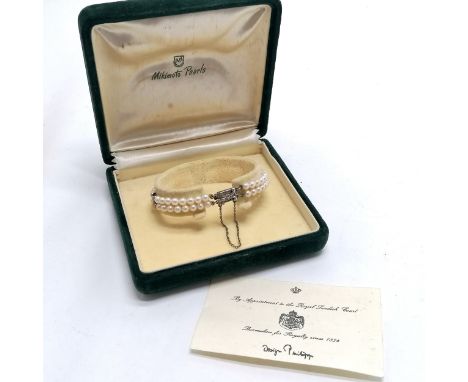 Mikimoto pearl 2 strand bracelet with silver clasp in original retail / presentation box (10.5cm x 9.8cm x 4cm high)