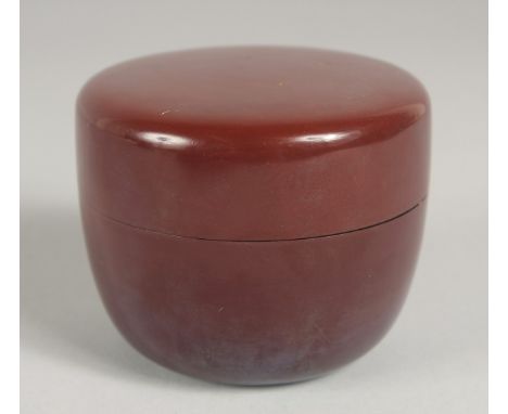 A JAPANESE LACQUER NATSUME / TEA CADDY, with draw-string sleeve in original fitted box, 7.5cm diameter.