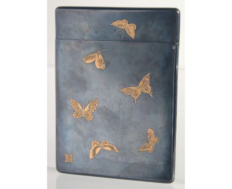 A JAPANESE MEIJI PERIOD SHAKUDO, GOLD AND SILVER INLAID CARD CASE, signed S. Komai, finely decorated with a female figure pla