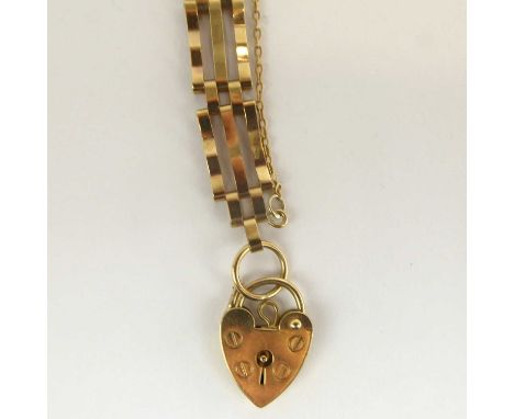 A 9ct gold three bar gate bracelet with a 9ct gold heart-shaped padlock clasp, length 18cm, approx. 7.6g.