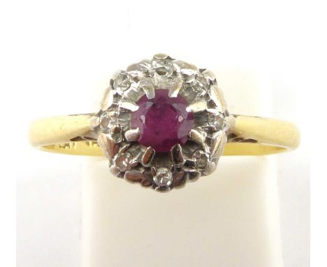 An 18ct gold platinum and ruby ring, size M, approx. 2.5g.