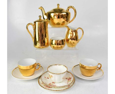 A small group of ceramics including a Royal Worcester gilt-heightened tea for two set, and a floral decorated trio.