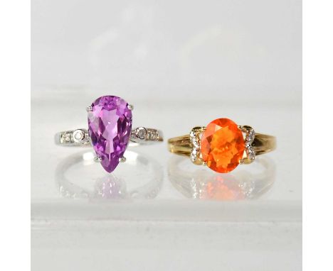 Two 9ct gold dress rings, comprising one set with a pear-shaped kunzite and diamonds, the second with a 'fire opal' and diamo