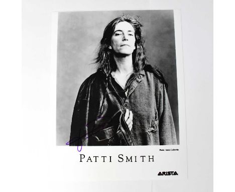 PATTI SMITH; a black and white photograph bearing the star's signature.Condition Report: We have not authenticated this signa