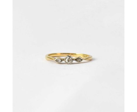 An 18ct yellow gold and tiny diamond three-stone ring, size O, approx. 2g.