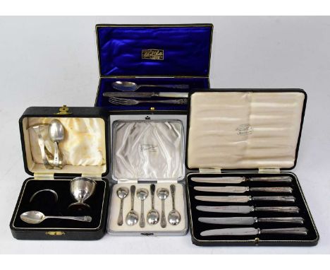 Four cased sets of hallmarked silver comprising a set of six coffee spoons, a three-piece Christening set with mother of pear