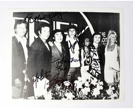 STAR TREK; a black and white photograph bearing the signatures of the original cast, to include William Shatner, Leonard Nimo