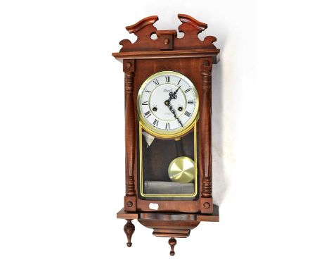 LINCOLN; a mahogany cased eight-day wall clock, the white dial set with Roman numerals, with glass panel to the base, length 