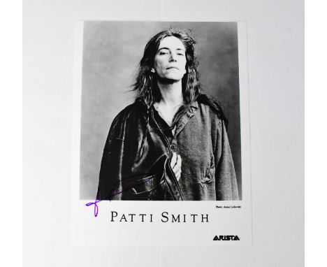 PATTI SMITH; a black and white photograph bearing the star's signature.Condition Report: We have not authenticated this signa