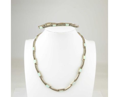 An Art Deco 925 silver semi-rigid necklace made of faux opal panels, joined with marcasite bar links, length approx. 40cm, wi