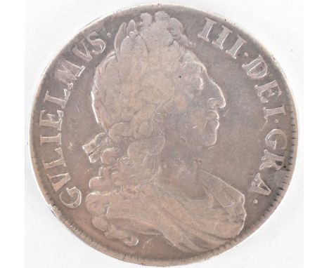 A William III milled silver crown 1697, third laureate and draped bust with legend.Condition Report: Condition is Good to Fin