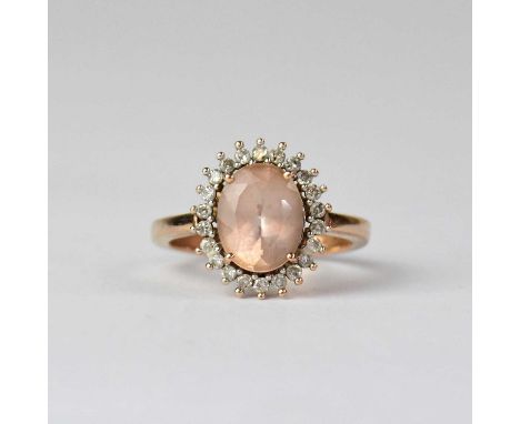 A 9ct yellow gold quartz and diamond chip ring, size N, approx. 3.1g.