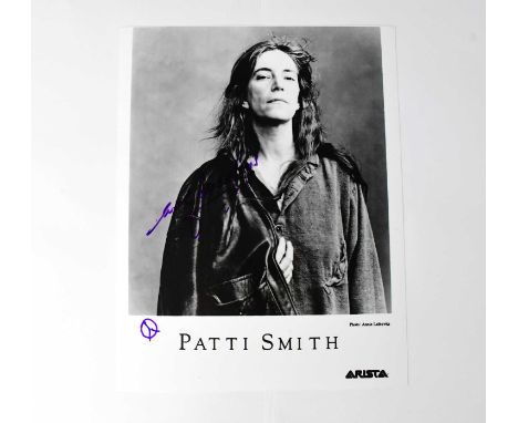 PATTI SMITH; a black and white photograph bearing the star's signature.Condition Report: We have not authenticated this signa