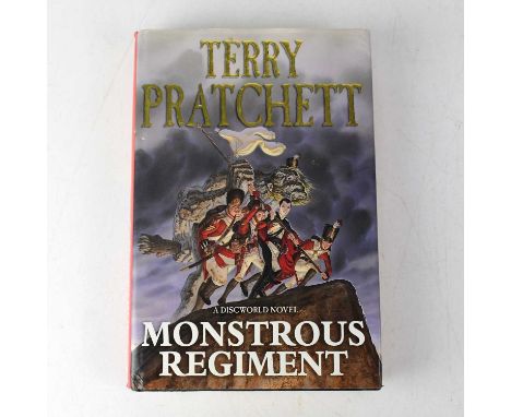 TERRY PRATCHETT; a Discworld novel 'Monstrous Regiment', bearing the signature of the author, inscribed 'To Peter'.Condition 