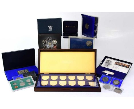 DANBURY MINT; a cased set of twelve proof silver ingots 'The Royal Arms', produced in celebration of Queen Elizabeth II's Sil