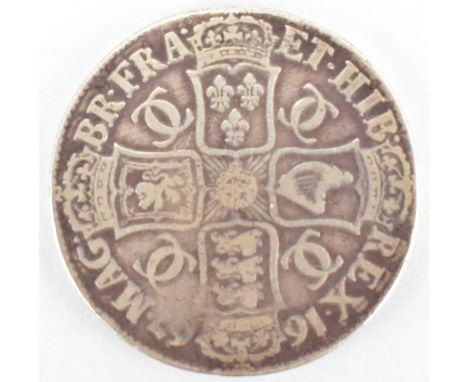 A Charles II silver milled crown 1667.Condition Report: Condition is Good to Fine.