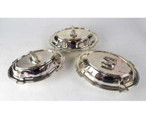 GORHAM; three silver covered tureens of Art Deco oval form, one larger and a pair of smaller examples, each with reeded borde
