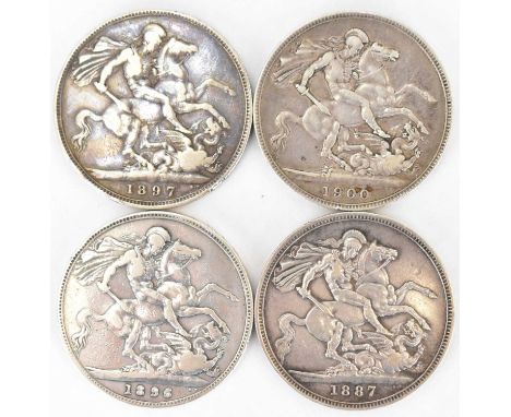 Four Victorian silver crowns comprising an 1887 Jubilee Head example, 1896, 1897 and 1900 Old Head examples, each in coin wal