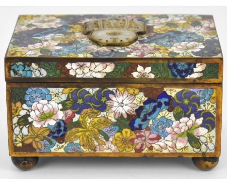 A late 19th/early 20th century Chinese cloisonné trinket box with carved jade-style floral tablet to the lid, all-over floral